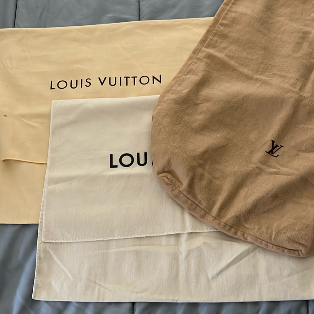 Three LV dust bags
